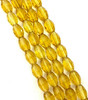 Strand of faceted rice glass beads - approx 8x6mm, Gold, approx 72 beads