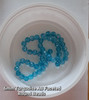 Strand of faceted round glass beads - approx 6mm, Turquoise AB, approx 50 beads, 12in