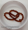 Strand of faceted round glass beads - approx 6mm, Amber, approx 50 beads, 12in