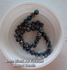 Strand of faceted round glass beads - approx 8mm, Black AB, approx 40 beads, 12in