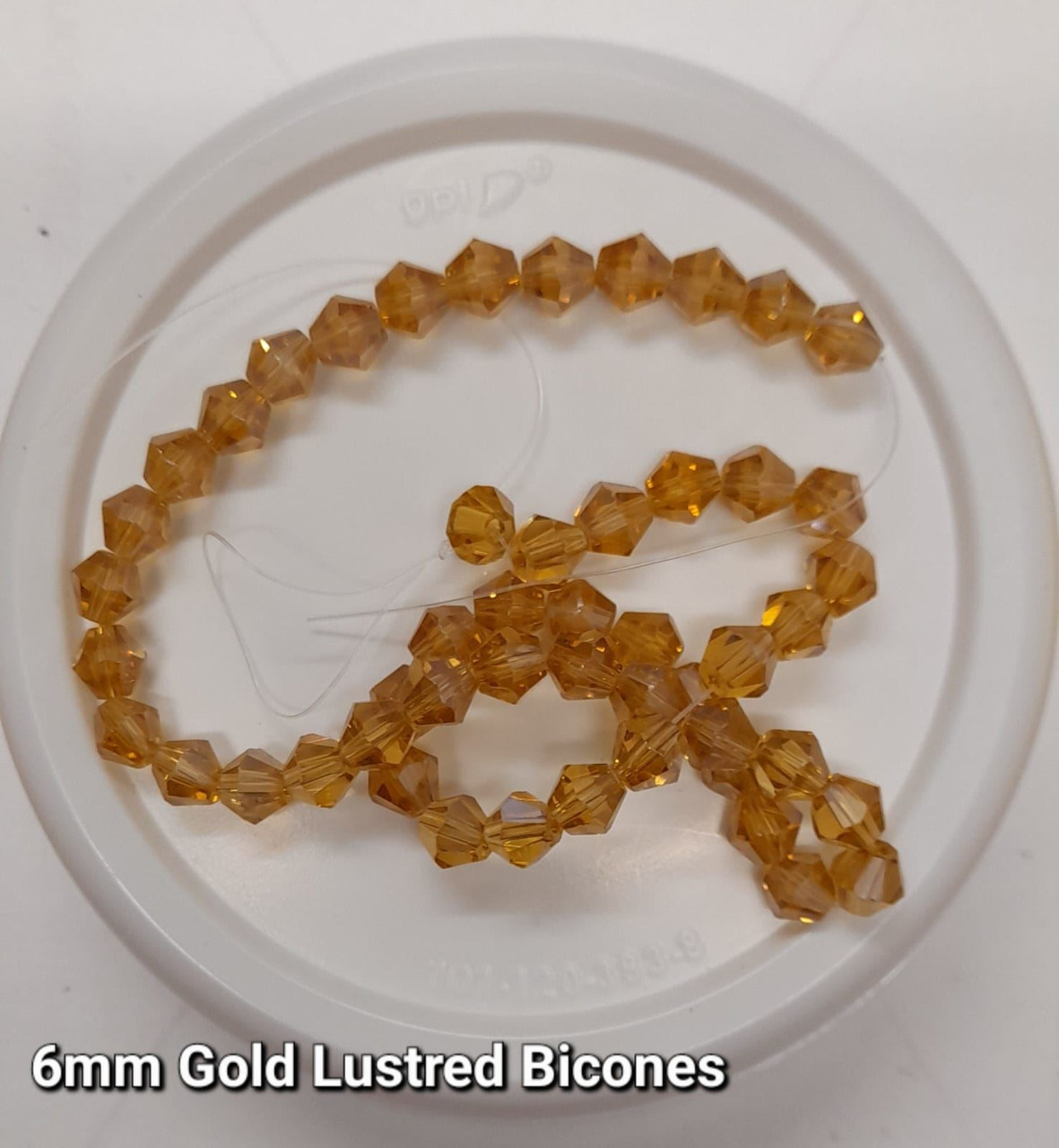 Strand of glass bicone beads - approx 6mm, Gold Lustered, approx 50 beads