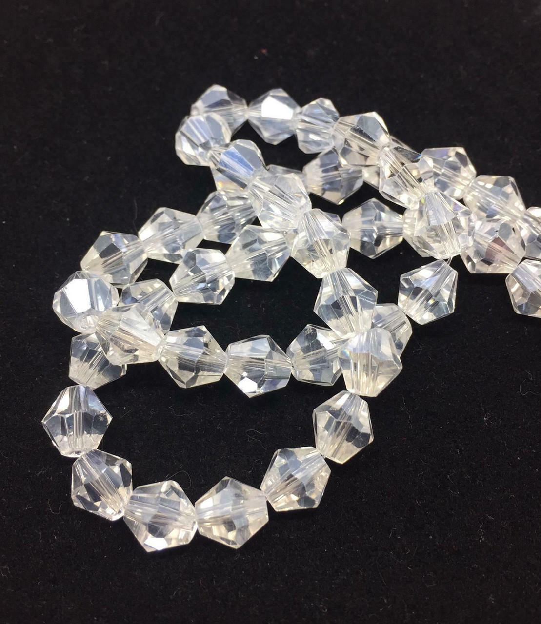 Strand of glass bicone beads - approx 8mm, Clear AB, approx 43 beads