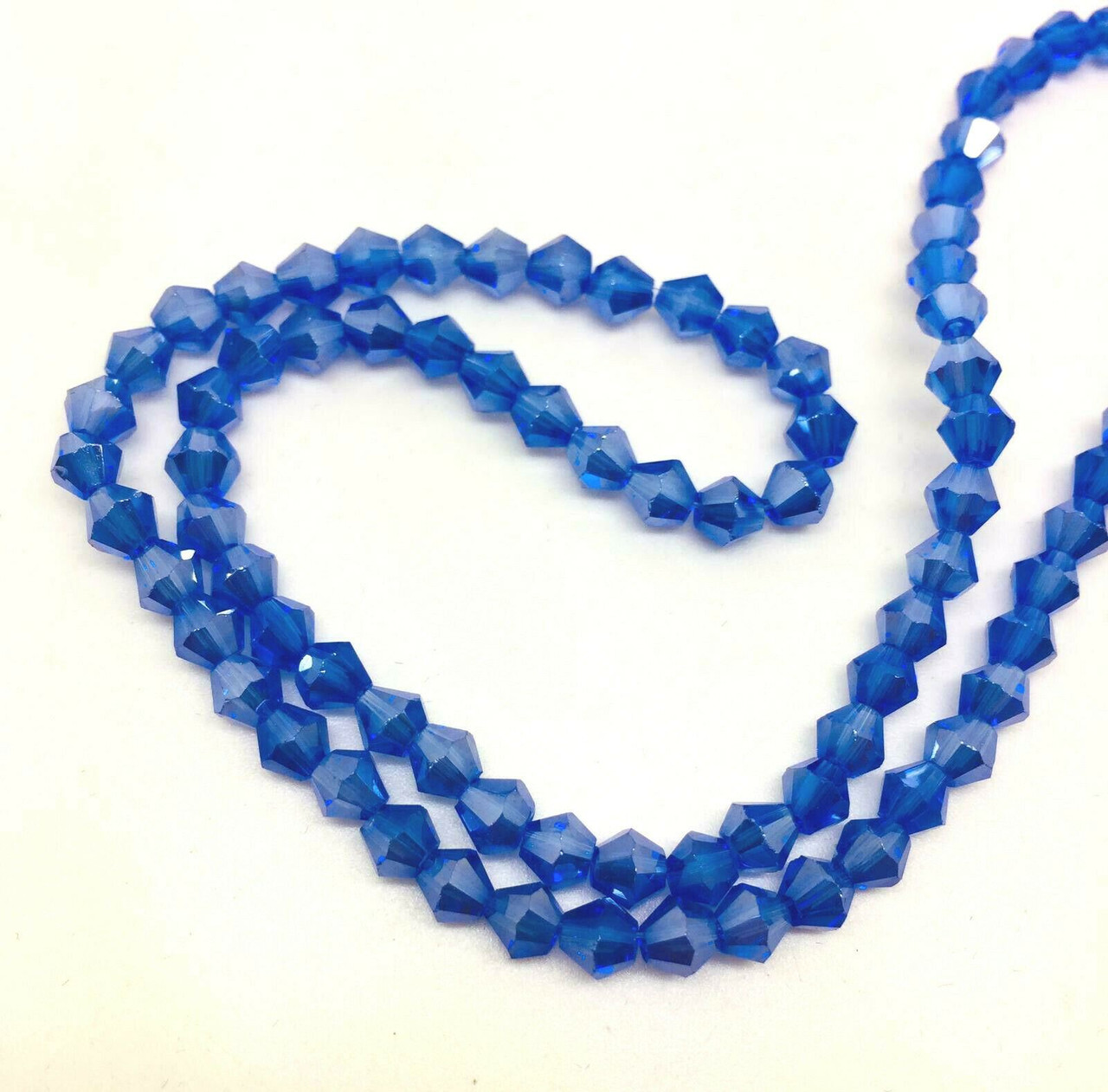 4mm Glass Bicone beads - DEEP BLUE LUSTERED - approx 16" strand (115-120 beads)