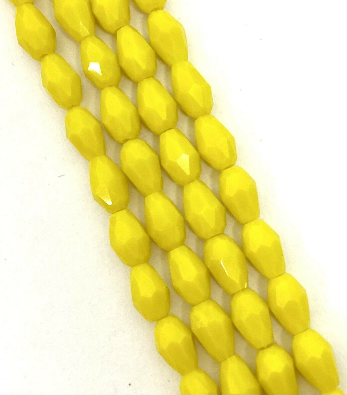 Strand of faceted drop glass beads (briolettes) - approx 6x4mm, Yellow Opaque, approx 72 beads