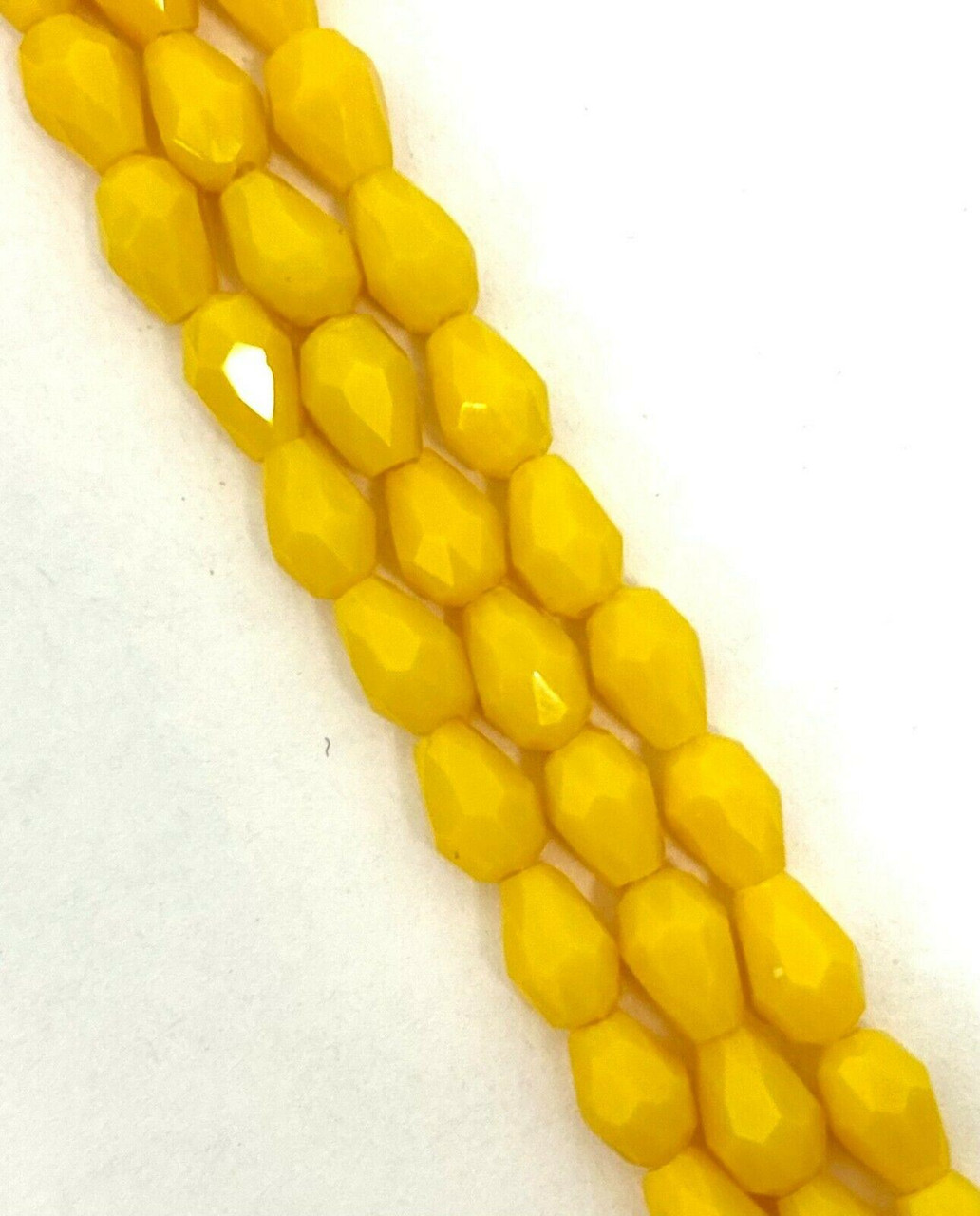 Strand of faceted drop glass beads (briolettes) - approx 6x4mm, Sunshine Yellow Opaque, approx 72 beads