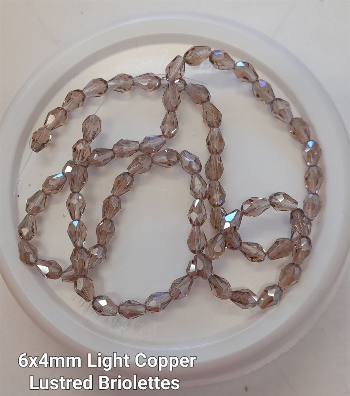 Strand of faceted drop glass beads (briolettes) - approx 6x4mm, Light Copper Lustered , approx 72 beads