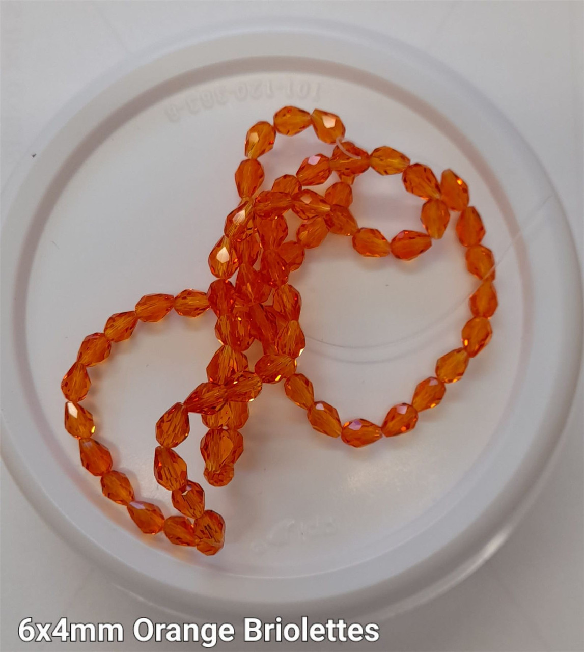 Strand of faceted drop glass beads (briolettes) - approx 6x4mm, Orange , approx 72 beads