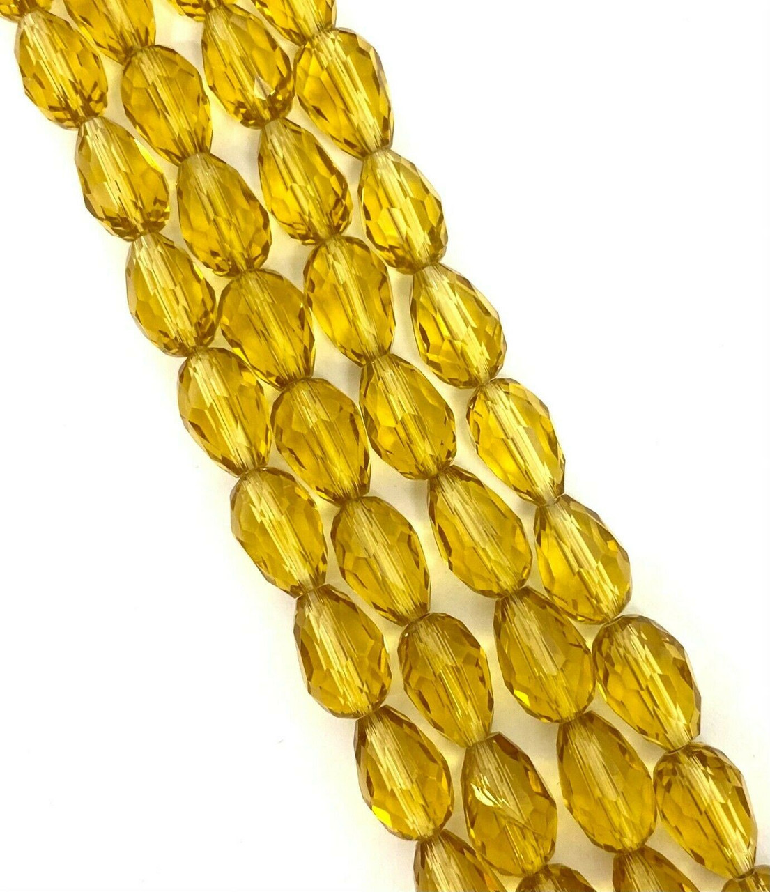 Strand of faceted drop glass beads (briolettes) - approx 6x4mm, Pale Gold, approx 72 beads