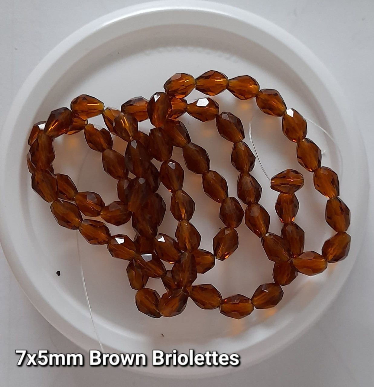 Strand of faceted drop glass beads (briolettes) - approx 7x5mm, Brown, approx 70 beads