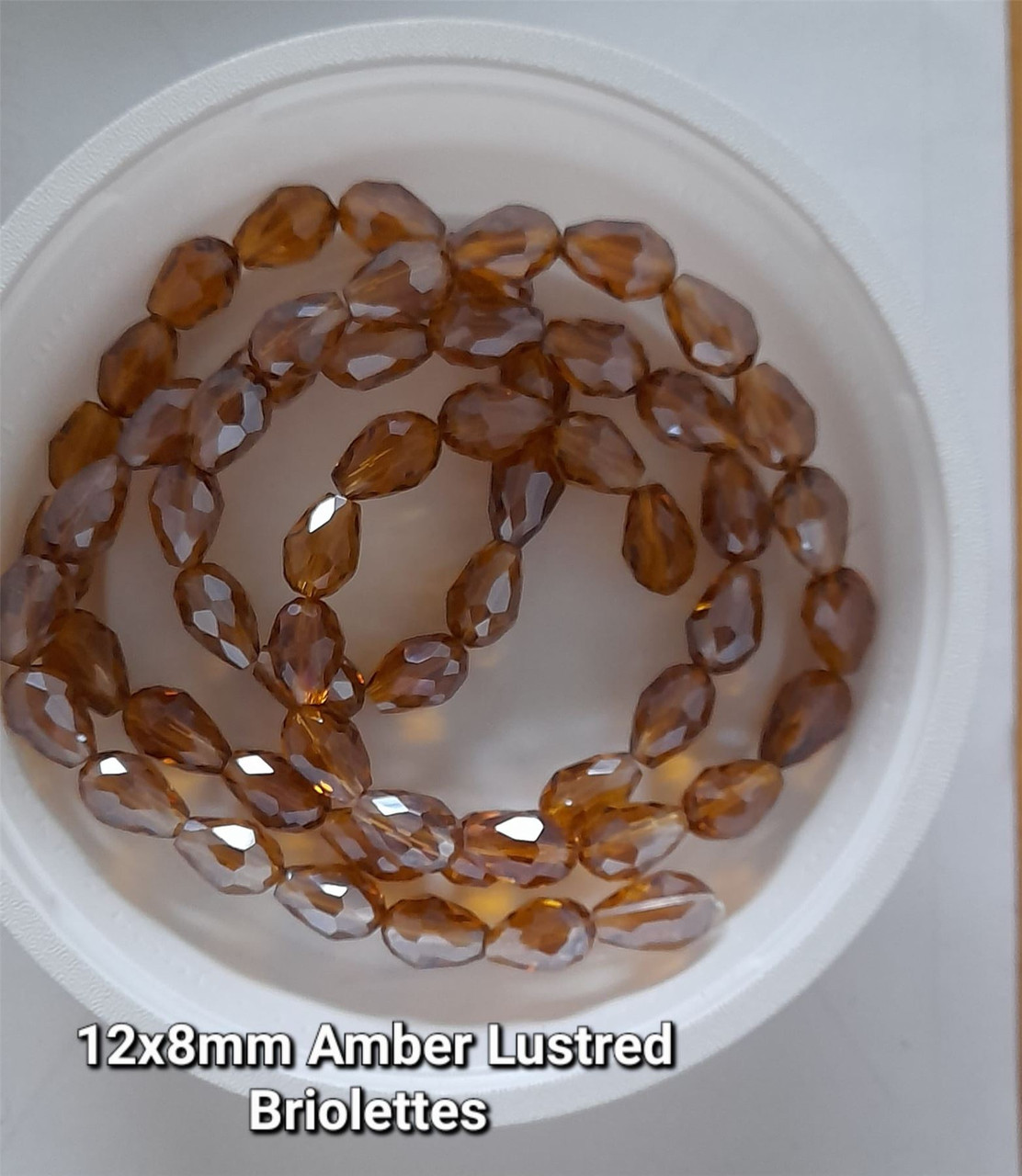 Strand of faceted drop glass beads (briolettes) - approx 12x8mm, Amber Lustered, approx 60 beads
