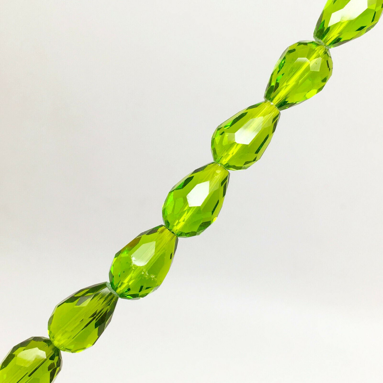 Strand of faceted glass drop beads (briolettes) - approx 11x8mm, Lime Green, approx 60 beads