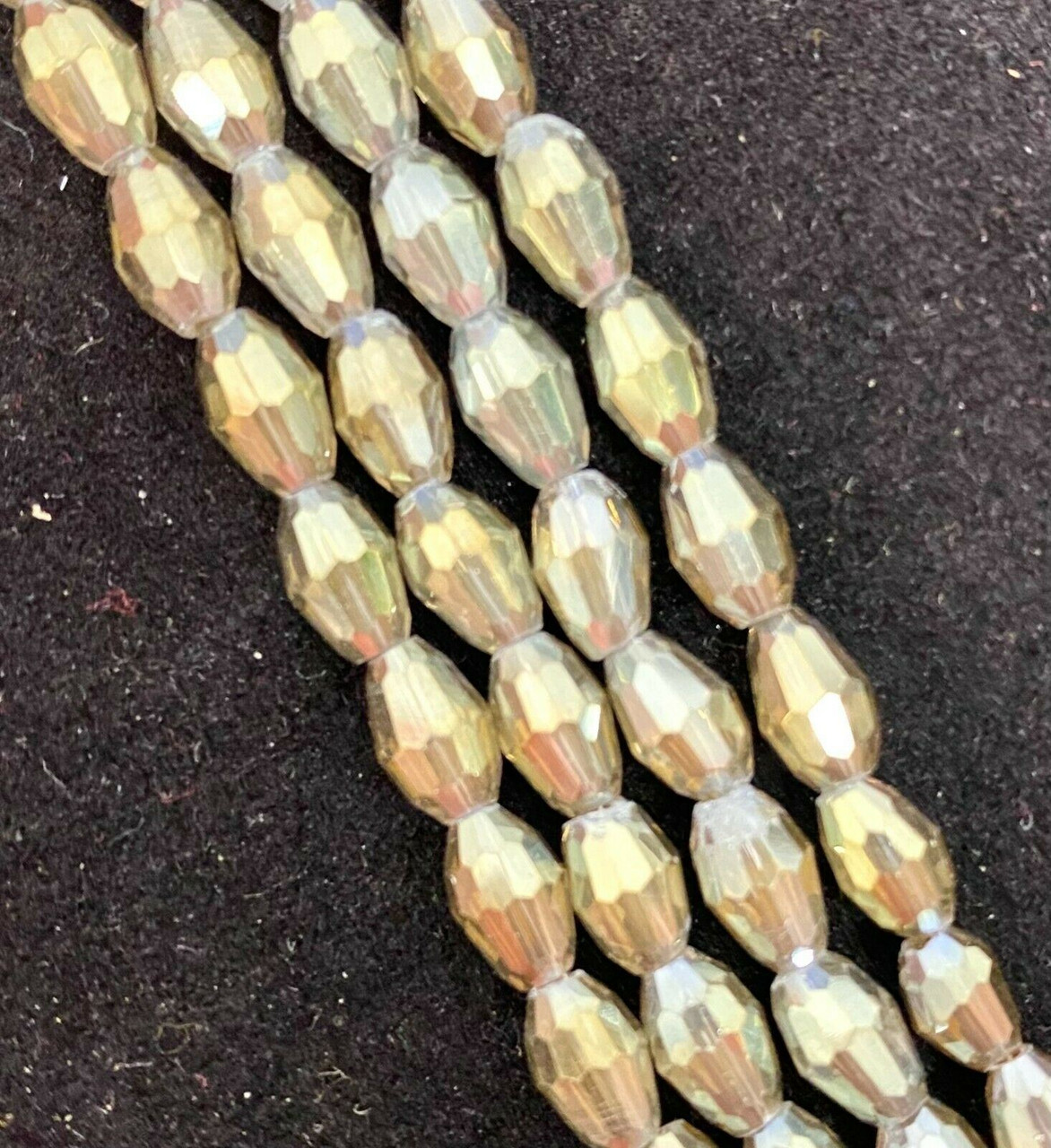 Strand of faceted rice glass beads - approx 6x4mm, Grey AB , approx 72 beads