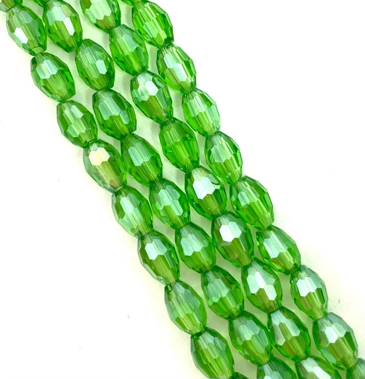 Strand of faceted rice glass beads - approx 6x4mm, Grass Green Lustered , approx 72 beads