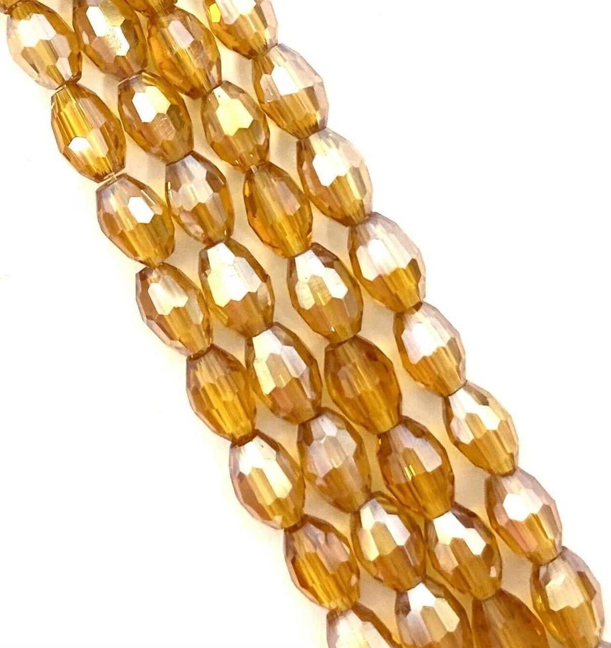 Strand of faceted rice glass beads - approx 6x4mm, Gold Lustered , approx 72 beads