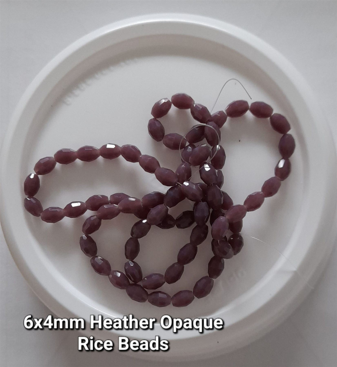 Strand of faceted rice glass beads - approx 6x4mm, Heather Opaque, approx 72 beads