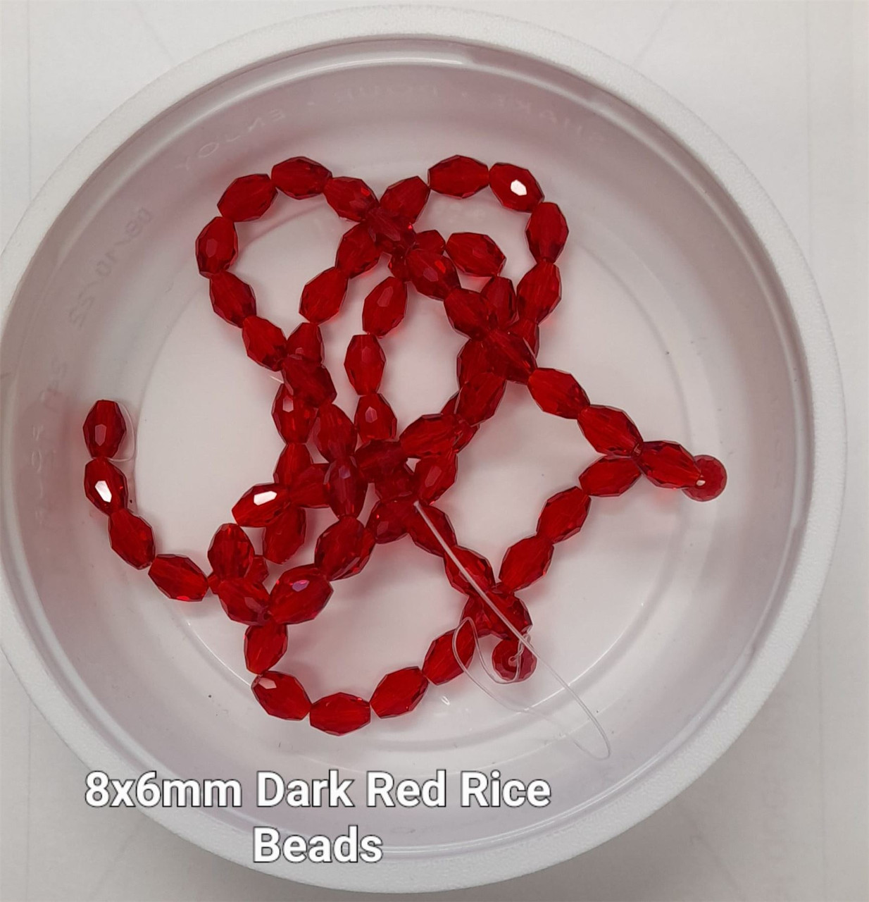 Strand of faceted rice glass beads - approx 8x6mm, DARK RED, approx 72 beads