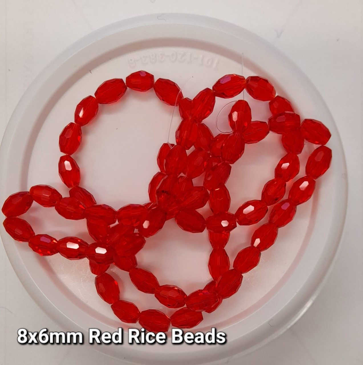 Strand of faceted rice glass beads - approx 8x6mm, RED, approx 72 beads