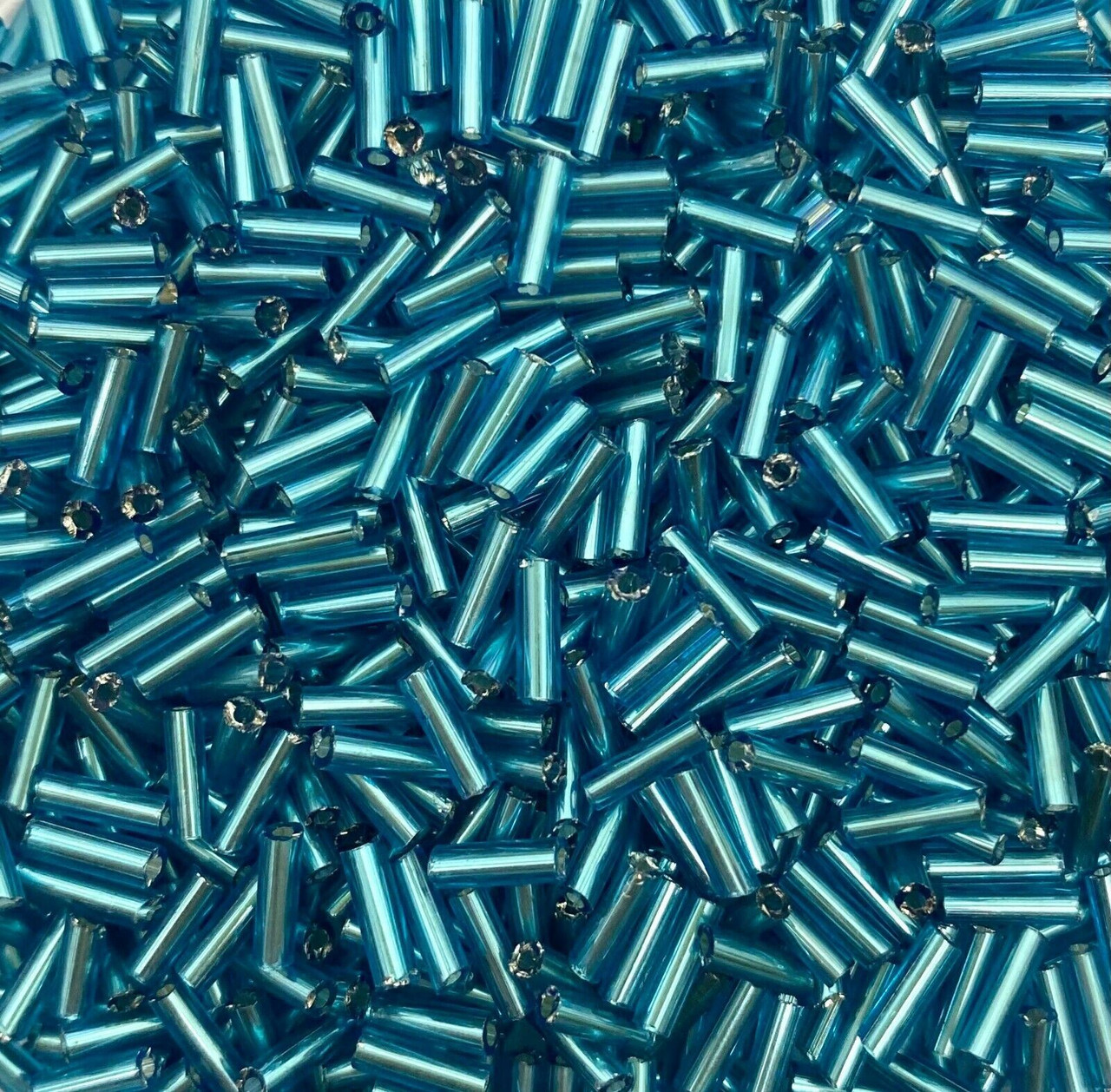 50g glass bugle beads - Turquoise Silver-Lined - approx 6mm