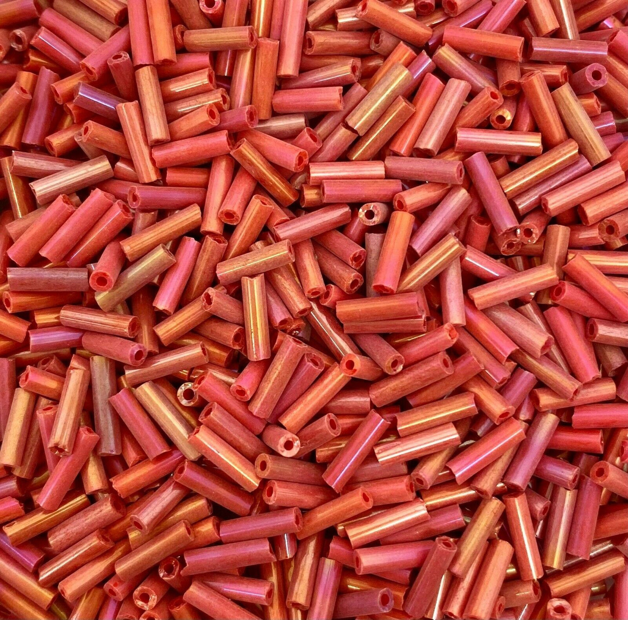 50g glass bugle beads - Red Opaque Rainbow - approx 6mm