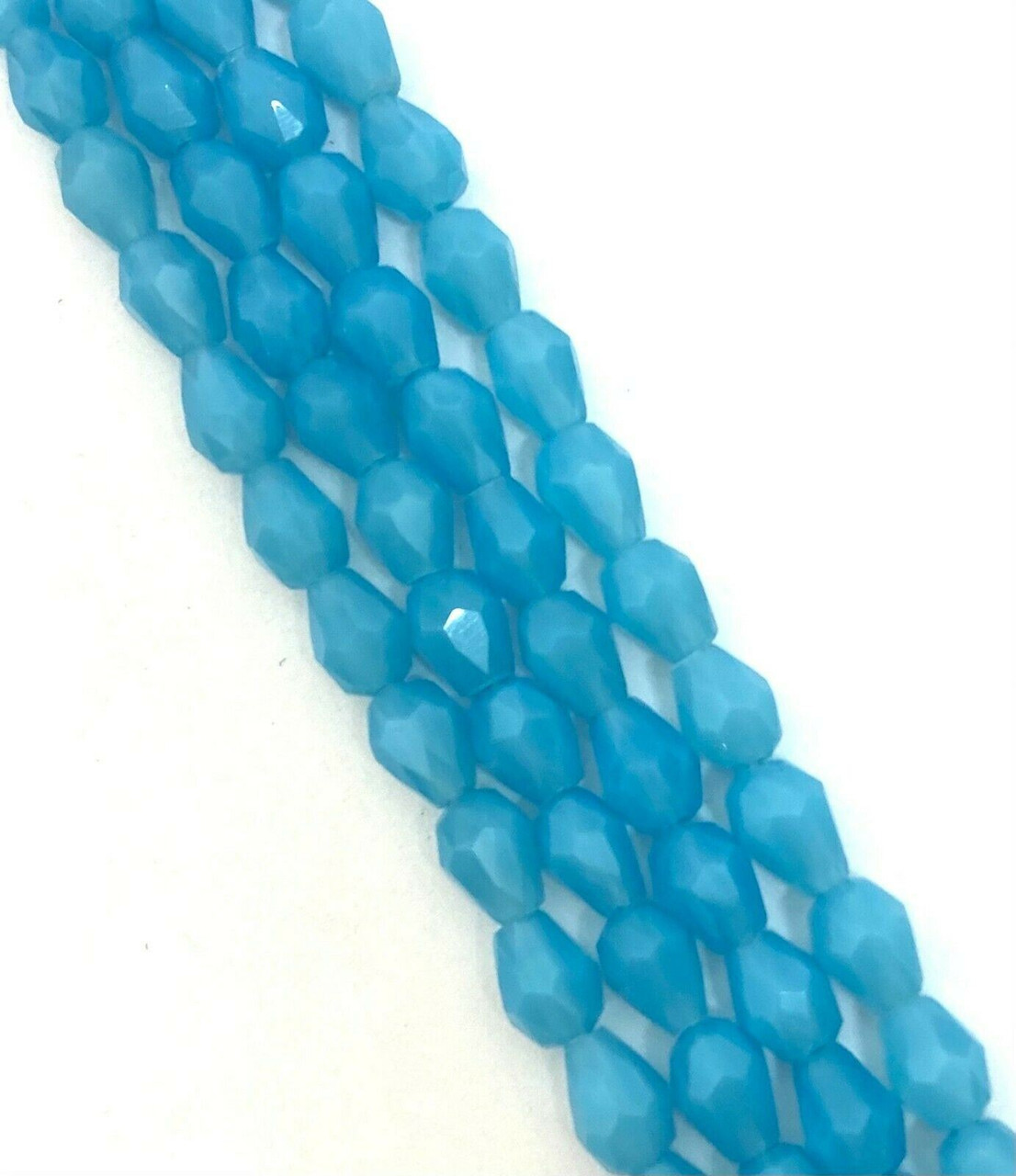 Strand of faceted drop glass beads (briolettes) - approx 11x7mm, Mid Blue Translucent, approx 72 beads