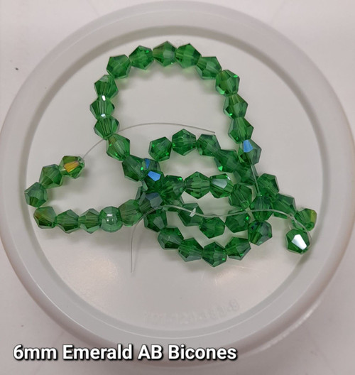 Strand of glass bicone beads - approx 6mm, Emerald Green AB, approx 50 beads
