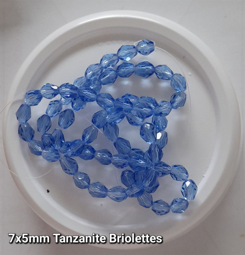 Strand of faceted drop glass beads (briolettes) - approx 7x5mm, Tanzanite , approx 70 beads