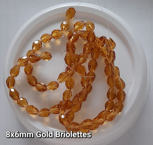 Strand of faceted drop glass beads (briolettes) - approx 8x6mm, Gold, approx 72 beads