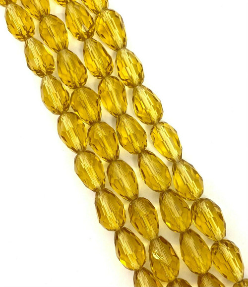 Strand of faceted glass drop beads (briolettes) - approx 11x8mm, Pale Gold, approx 60 beads