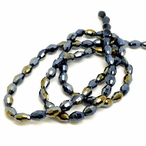 Strand of faceted rice glass beads - approx 6x4mm, Black AB , approx 72 beads