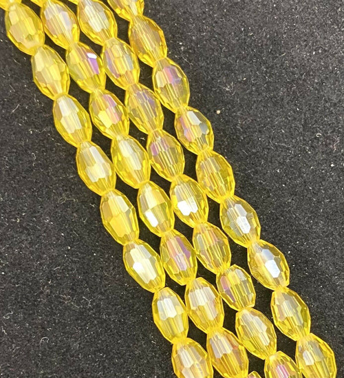 Strand of faceted rice glass beads - approx 6x4mm, Yellow AB, approx 72 beads