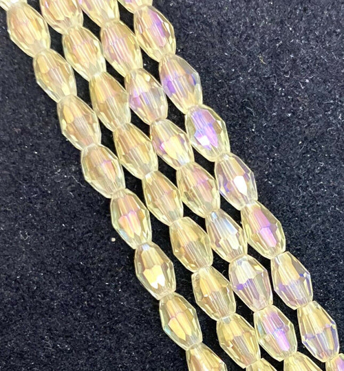 Strand of faceted rice glass beads - approx 6x4mm, Pale Yellow AB , approx 72 beads