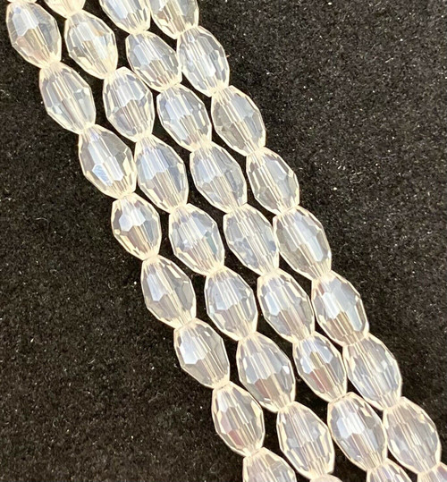 Strand of faceted rice glass beads - approx 6x4mm, Clear Lustered , approx 72 beads