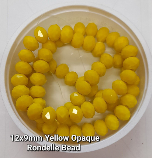 Strand of faceted rice glass beads - approx 6x4mm, Yellow Opaque, approx 72 beads