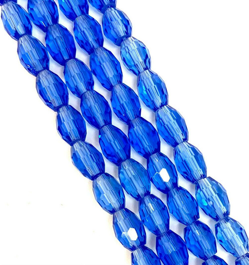 Strand of faceted rice glass beads - approx 6x4mm, Tanzanite, approx 72 beads
