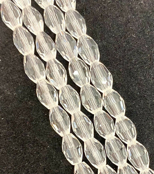 Strand of faceted rice glass beads - approx 6x4mm, Clear, approx 72 beads