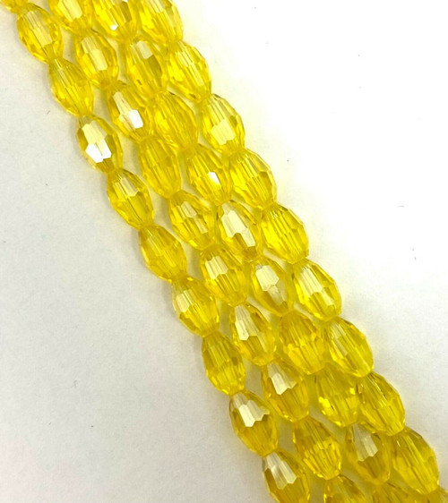 Strand of faceted rice glass beads - approx 6x4mm, Yellow, approx 72 beads