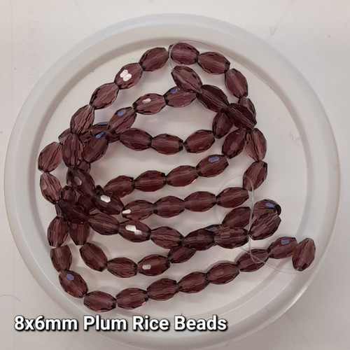 Strand of faceted rice glass beads - approx 8x6mm, Plum, approx 72 beads