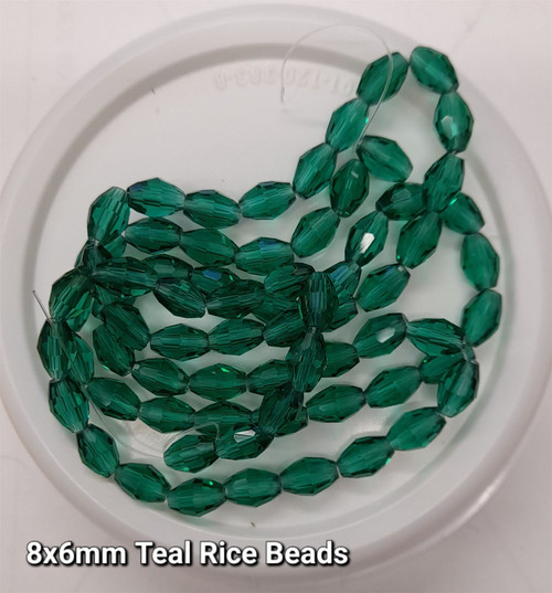 Strand of faceted rice glass beads - approx 8x6mm, Teal, approx 72 beads