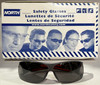 North Safety Products Black Frame, Smoke Lens Glasses Pack of 12 T13502