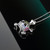 Sterling Silver 3D Skull and Crossbones Pendant | Gothic Sugar Skull with Multicolor CZ Floral Accents