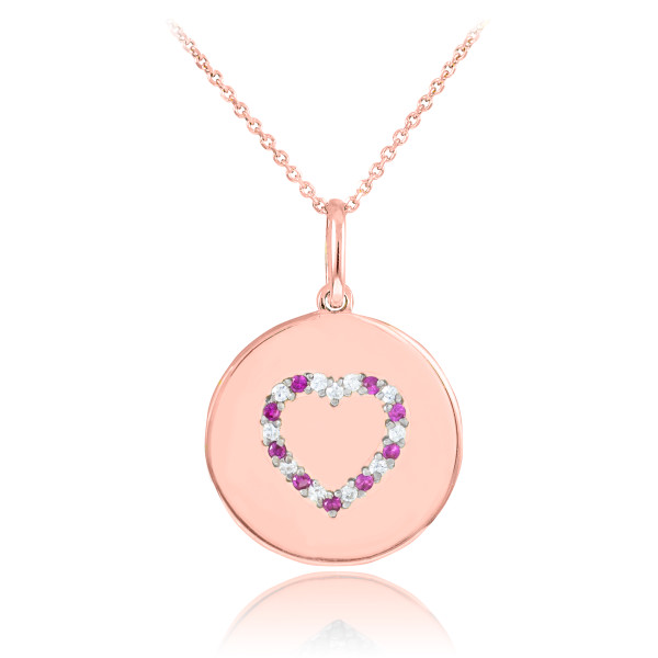 Heart disc pendant necklace with diamonds and rubies in 14k rose gold.
