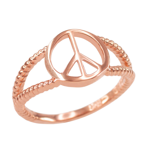 Rose gold Peace symbol ring.