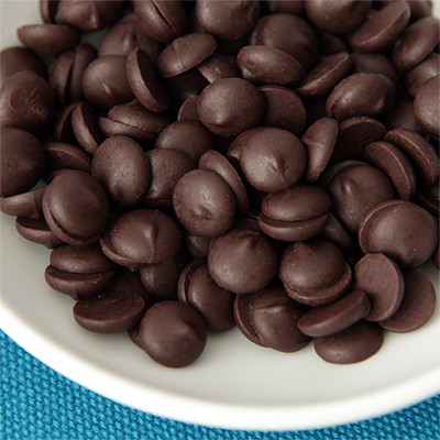 100% cacao, organic unsweetened chocolate chips. These Criollo mini wafers are delicate flavored baking chips.