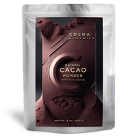 12 oz Flavanol Cocoa Dynamics cocoa powder package is shown on a white background with a key light from the audience right.