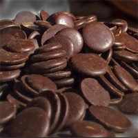 Belgian Dark Chocolate is excellent for all bulk wholesale chocolate uses. Our most popular European chocolate for truffle making and chocolate bar production. In the shape of Belgian chocolate morsels called callets. Dark chocolate flavor but still smooth and rich with an even melt.