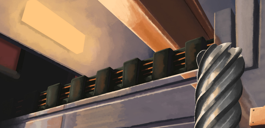 drill bit with a conveyor belt in a factory in the background