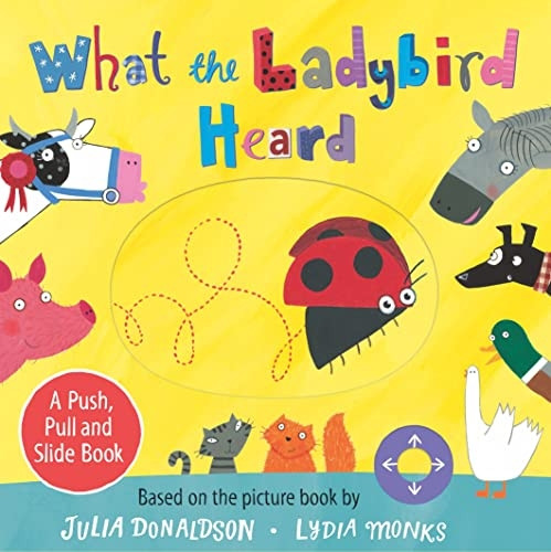 What the Ladybird Heard: A Push, Pull and Slide Board Book [Board book]