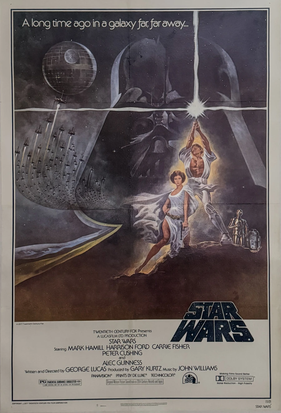 Star Wars original style A movie poster printed 1977 linen backed depicts Luke and Leia with Darth Vader in the backdrop
