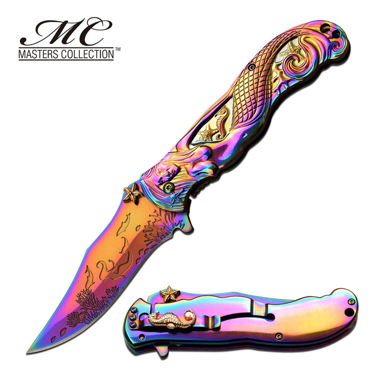 Spring Assisted Rainbow Mermaid Knife
•3.8" 3MM THICK BLADE, STAINLESS STEEL
•RAINBOW TITANIUM COATED BLADE, WITH ACID ETCH SEA ART
•5" CLOSED
•FULL RAINBOW TITANIUM COATED STAINLESS STEEL, 3D SCULPTED MERMAID
•SEA STAR THUMB STUD, GOLD TITANIUM COATED CLIP W/ SEA HORSE
