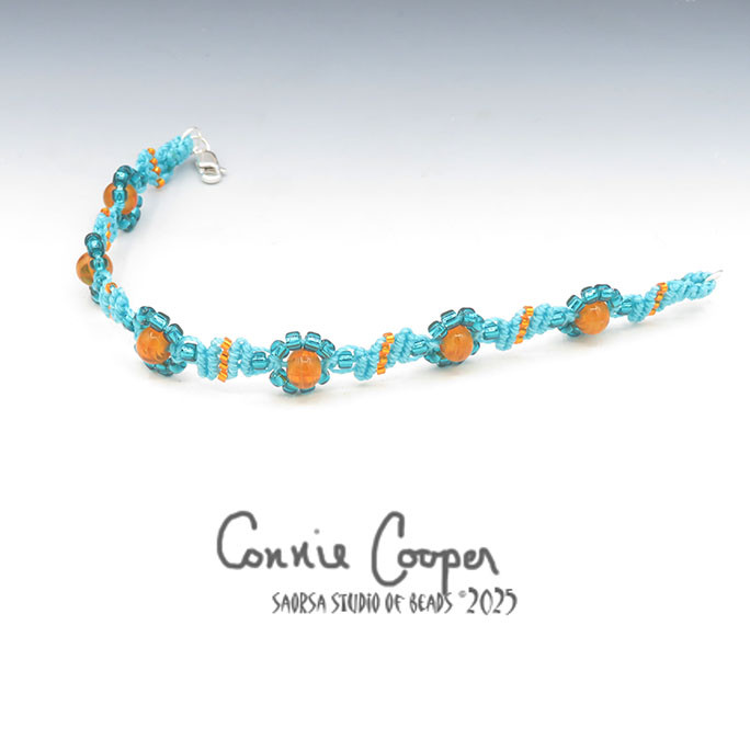 Bracelet, Daisy Chain,  6-Bead in Ice Blue & Striated Amber  MBra26-7680